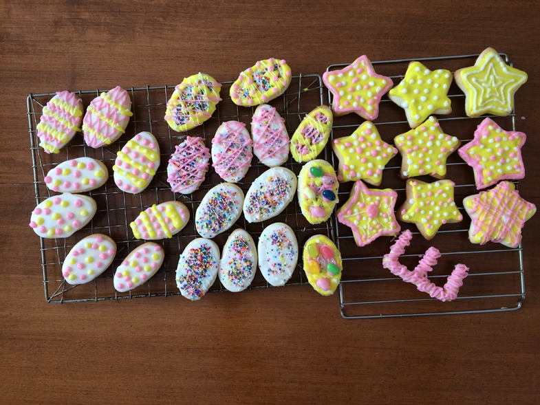  decorated easter cookies on rack